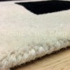 Tapis Contemporain Simbols noir et blanc en laine par Carving Tapis Contemporain Simbols noir et blanc en laine par Carving