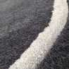 Tapis design vague avec du relief gris foncé et fines vagues en gris clair Tapis design vague avec du relief gris foncé et fines vagues en gris clair