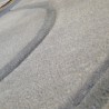 Tapis design vague avec du relief gris clair et fines vagues en gris plus foncé Tapis design vague avec du relief gris clair et fines vagues en gris plus foncé