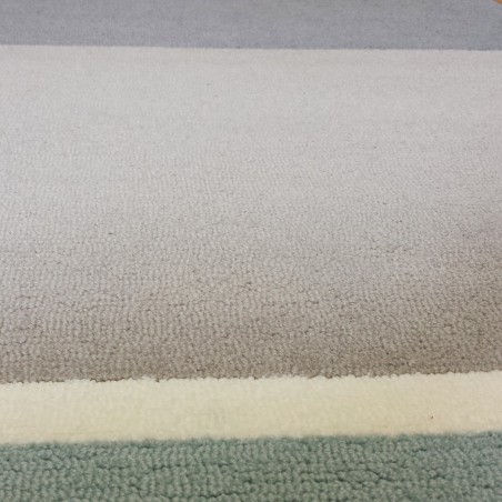 Tapis Esprit Home en acrylique bleu, taupe et sable Tapis Esprit Home en acrylique bleu, taupe et sable
