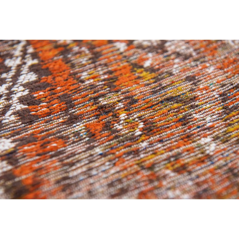 Tapis kelim design dans les tons orangés