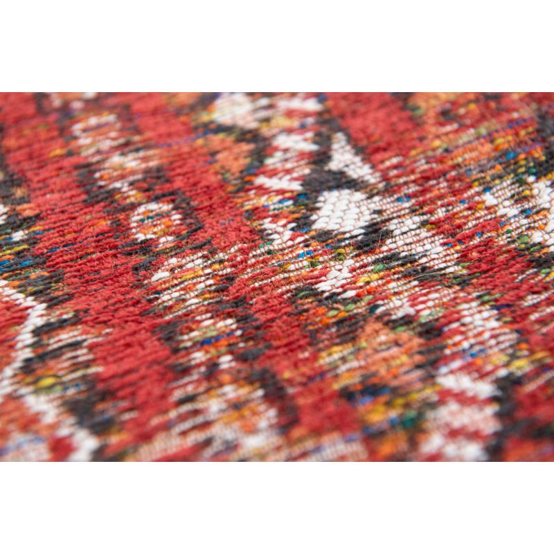 Tapis style ethnique rouge par Louis de Poortere