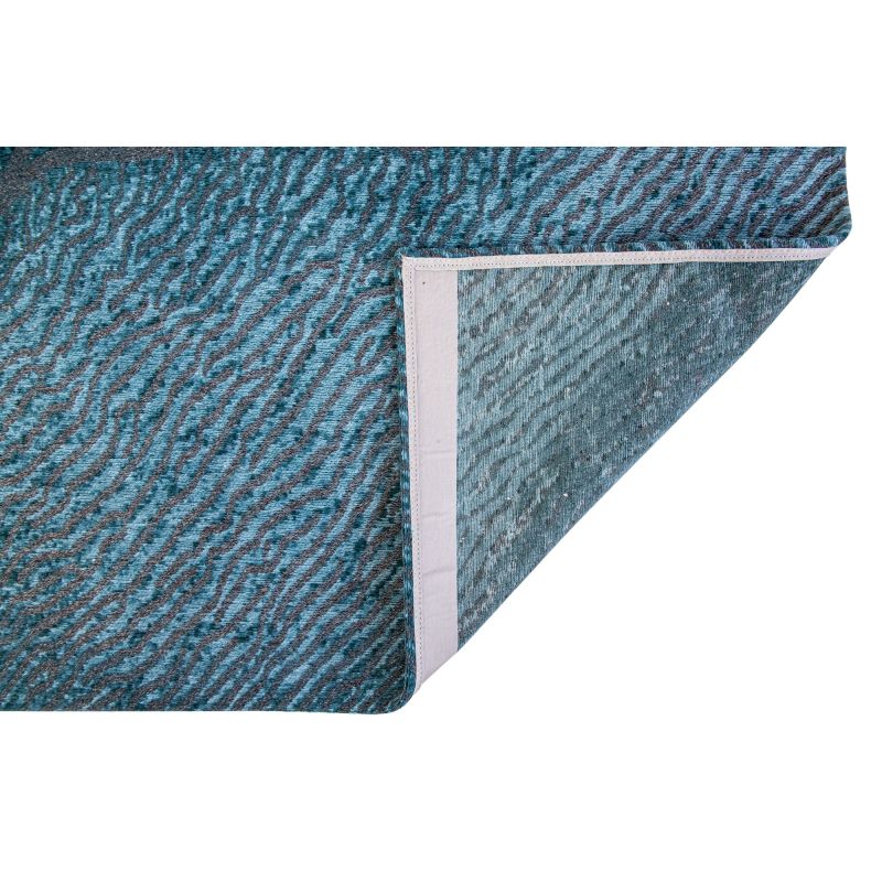Tapis design en fibres naturelles bleues