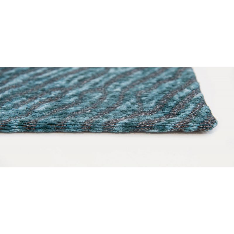 Tapis facile d'entretien de couleur bleu par Louis de Poortere