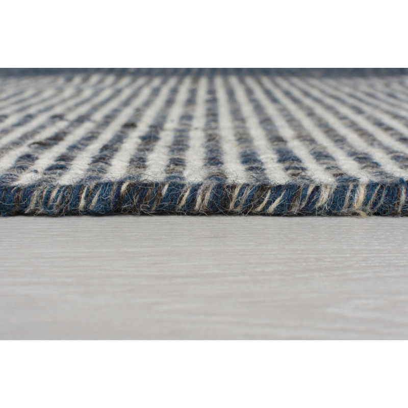 Tapis bleu et ivoire en laine et coton