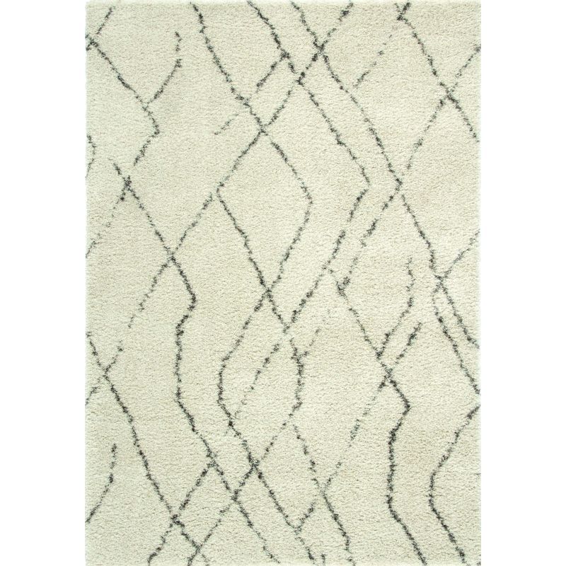 Tapis de salon design en laine et polyester Subra beige motifs géométriques gris