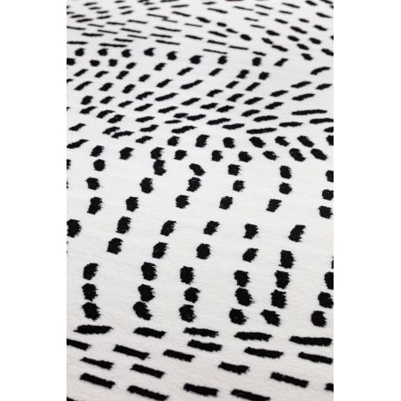 Tapis de salon contemporain Naos points noir sur fond blanc en polyester Tapis de salon contemporain Naos points noir sur fond blanc en polyester