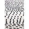 Tapis de salon contemporain Naos points noir sur fond blanc en polyester Tapis de salon contemporain Naos points noir sur fond blanc en polyester