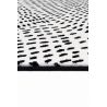 Tapis de salon contemporain Naos points noir sur fond blanc en polyester Tapis de salon contemporain Naos points noir sur fond blanc en polyester