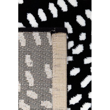 Tapis de salon contemporain Naos points blanc fond noir en polyester Tapis de salon contemporain Naos points blanc fond noir en polyester