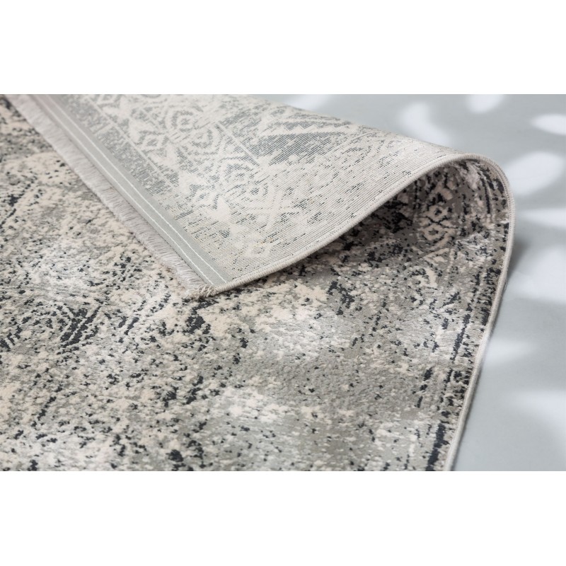 Tapis Vintage Positano Noir et gris motifs anciens en viscose et acrylique