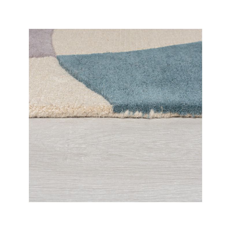 Tapis de salon pure laine bleu radiance glow