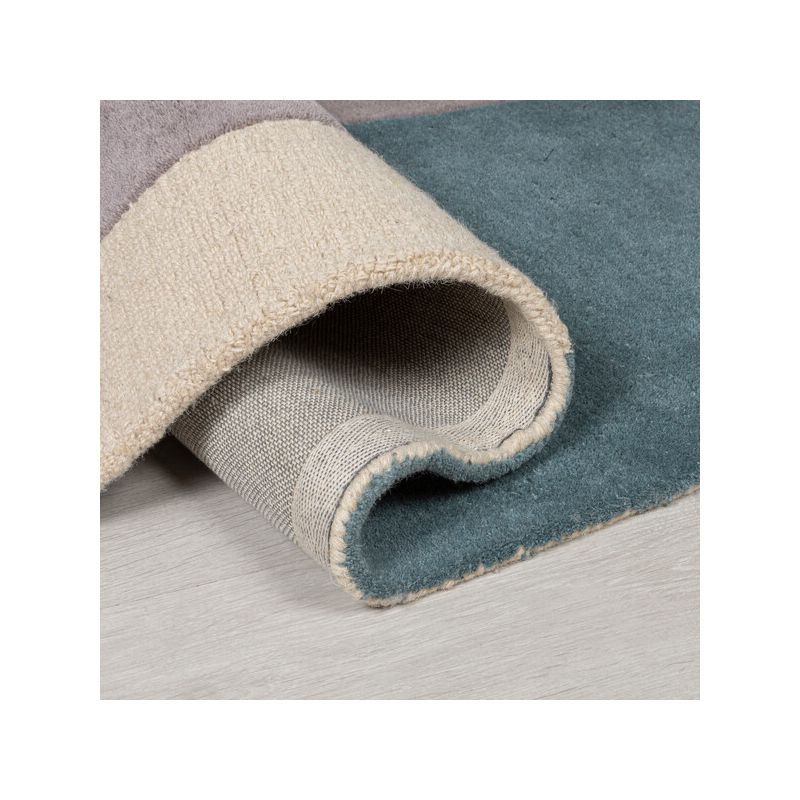 Tapis d'entrée pure laine bleu radiance glow