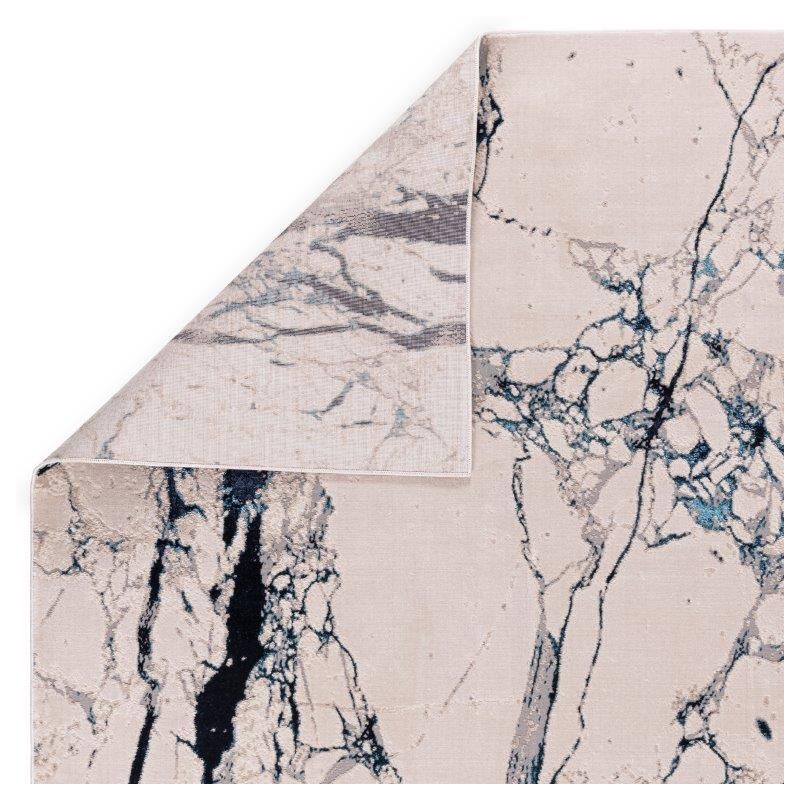 Tapisde salon contemporain polyester Angara Quake nuances de bleu, gris et écru