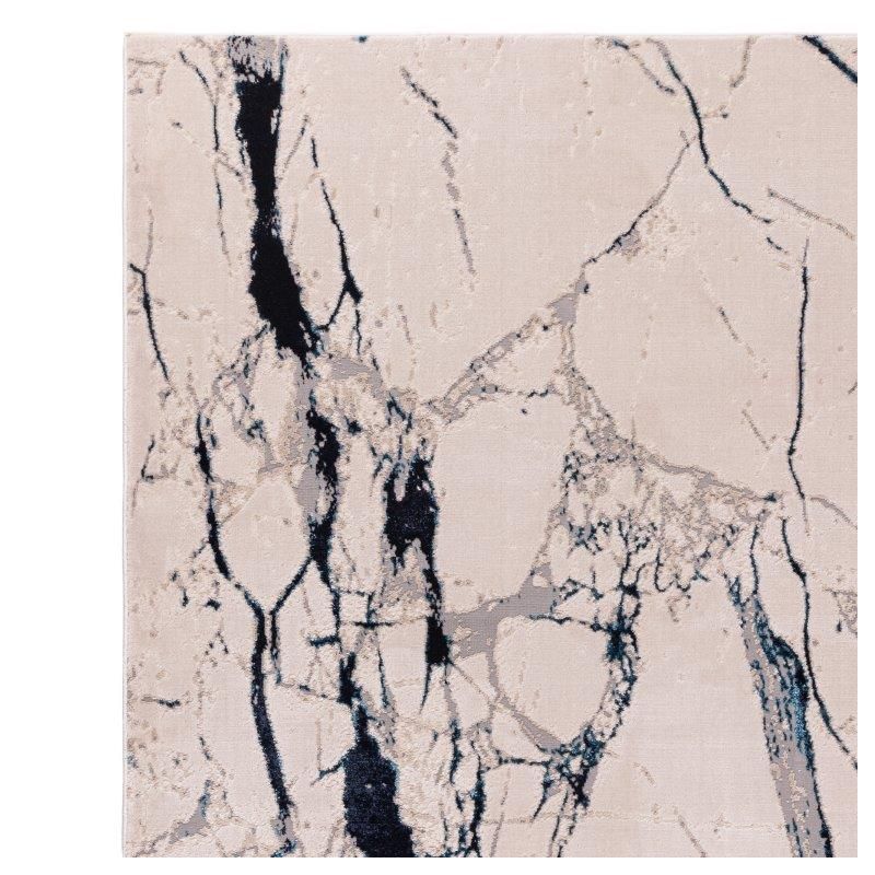 Tapisde salon contemporain polyester Angara Quake nuances de bleu, gris et écru