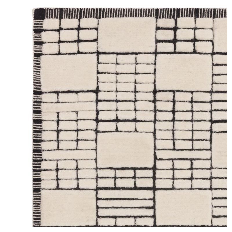 Tapis de salon moderne en laine de Nouvelle-Zélande Ushuaïa crème et noir