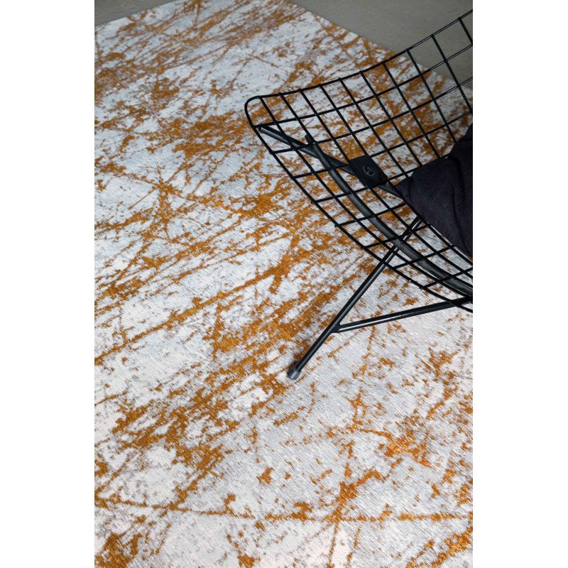 Tapis de Salon Design tissé plat Stella Astro Gold fauteuil