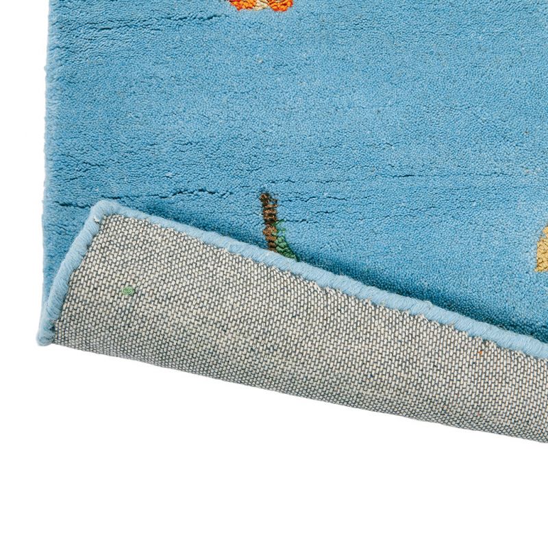 Tapis de salon graphique laine et viscose Hummingbird Bleu dos Wedgwood sejour