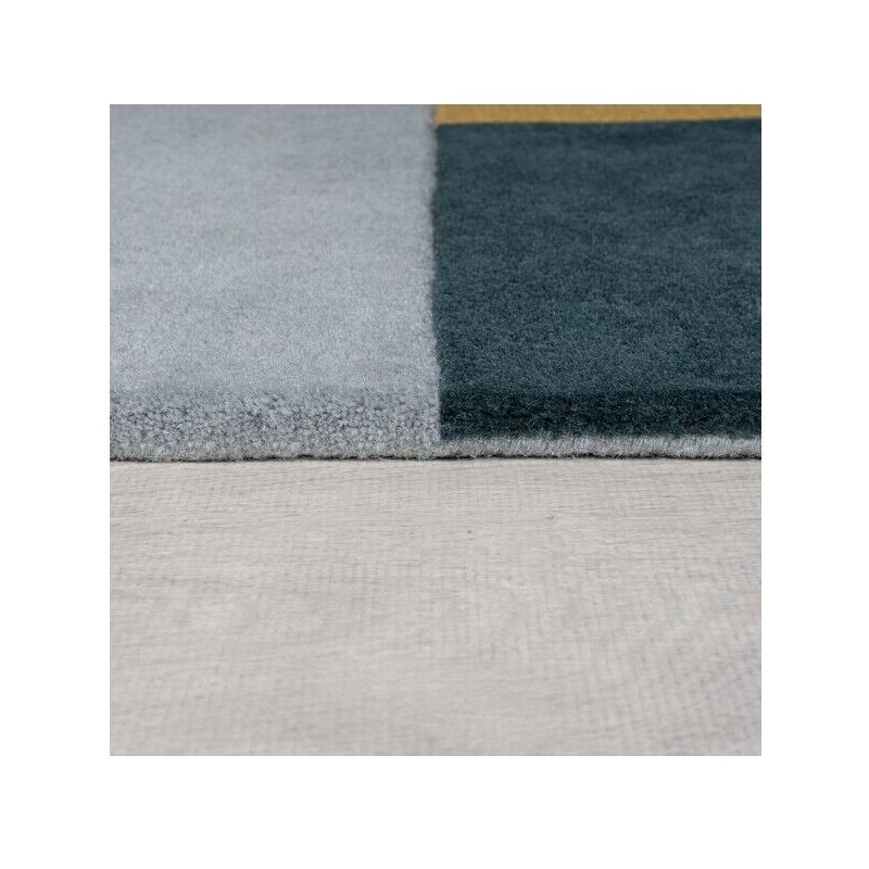 Tapis de salon géométrique en laine moderno multicolore Alwyn Pink