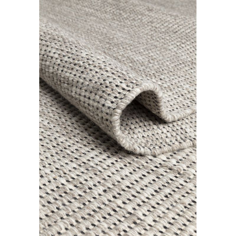 Tapis tissé main en laine Marvel noir et écru