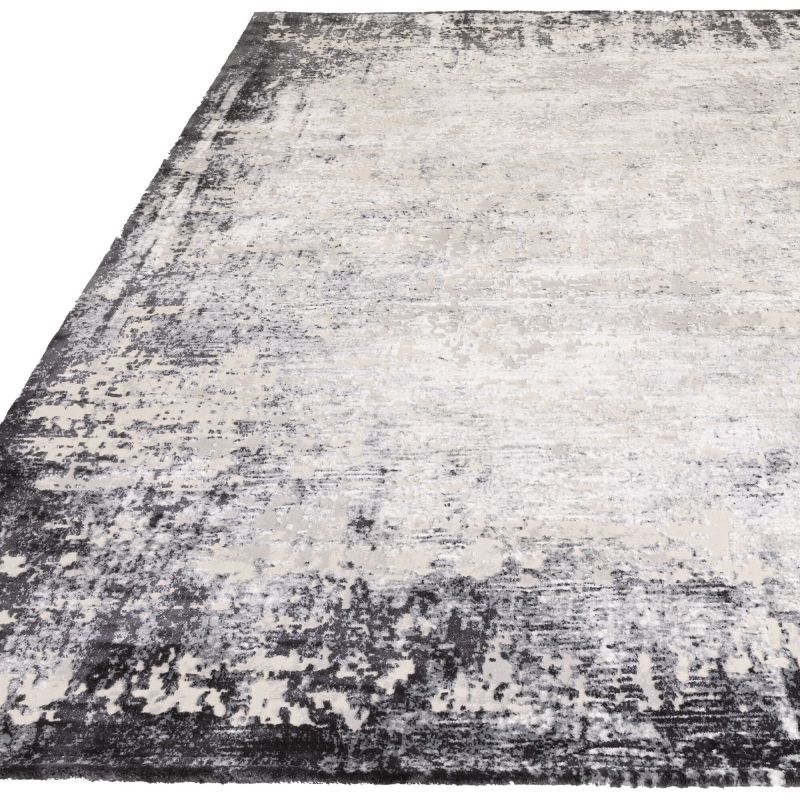 Tapis de salon enfibres synthétiques Altaï Border gris anthracite