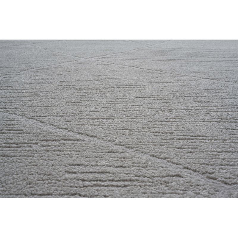 Tapis de salon à reliefs en fibres synthétiques Laïka écru