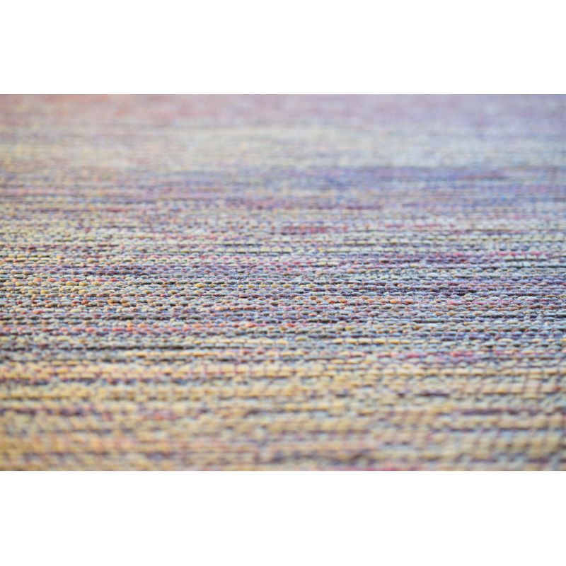 Tapis indoor/ outdoor en polypropylène Tokela lavable jet d'eau