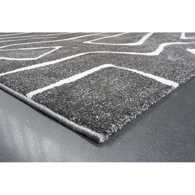 Tapis de salon polyester haut de gamme Magena design motifs blancs sur fond noir décoration moderne