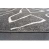 Tapis de salon polyester haut de gamme Magena design motifs blancs sur fond noir chambre