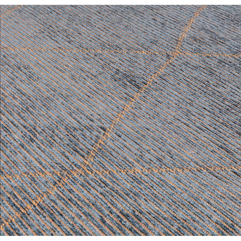 Tapis Bleu motifs beige Mioma zoom texture