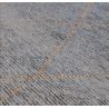 Tapis Bleu motifs beige Mioma zoom texture