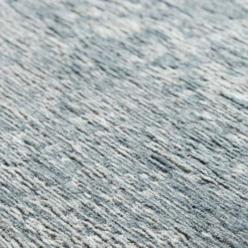 Tapis en laine et coton chenille bleu chiné Kano