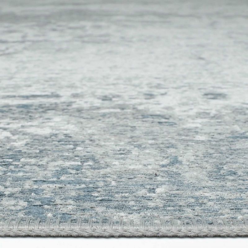 Tapis en laine et coton chenille bleu chiné Kano