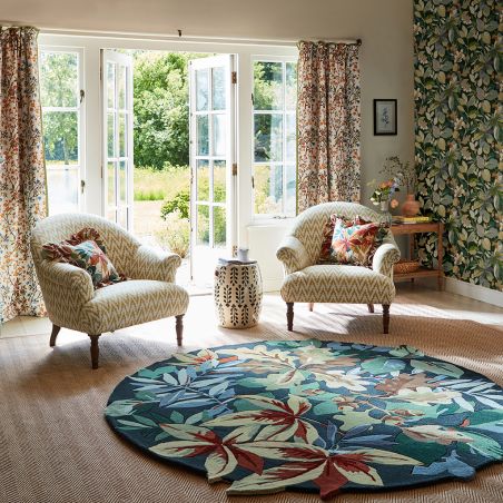 Tapis rond en laine forme organique feuillage débordant vert Robin's wood Tapis rond en laine forme organique feuillage débordant vert Robin's wood