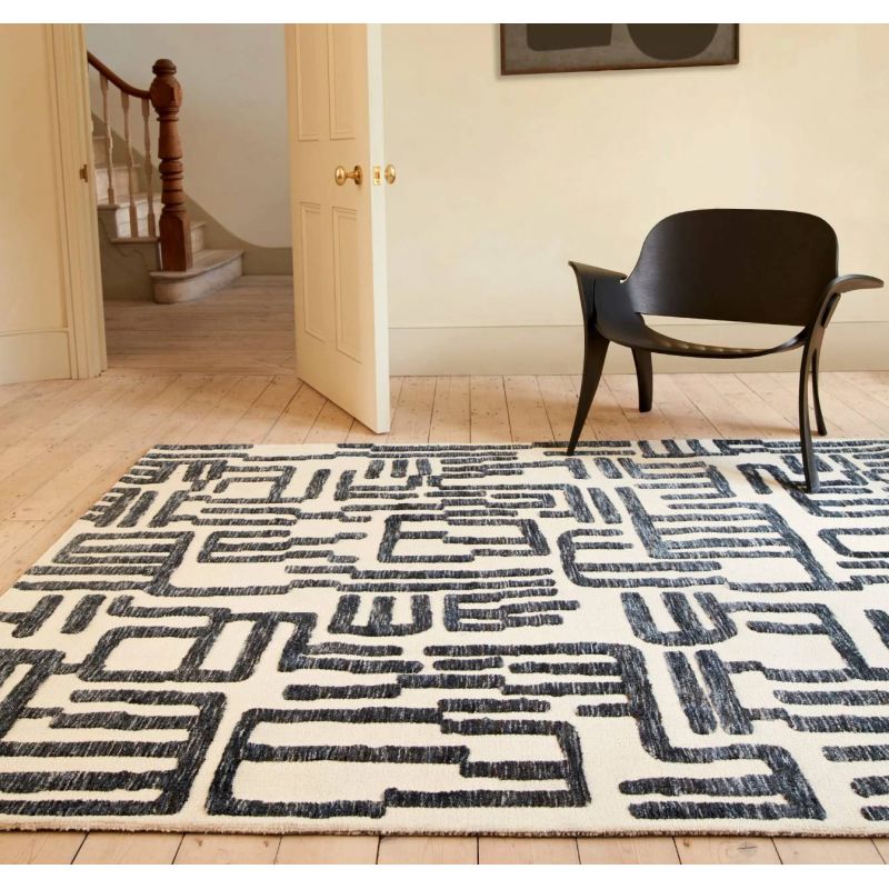 Tapis moderne abstrait noir et blanc script Brasilia