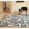 Tapis moderne abstrait noir et blanc script Brasilia
