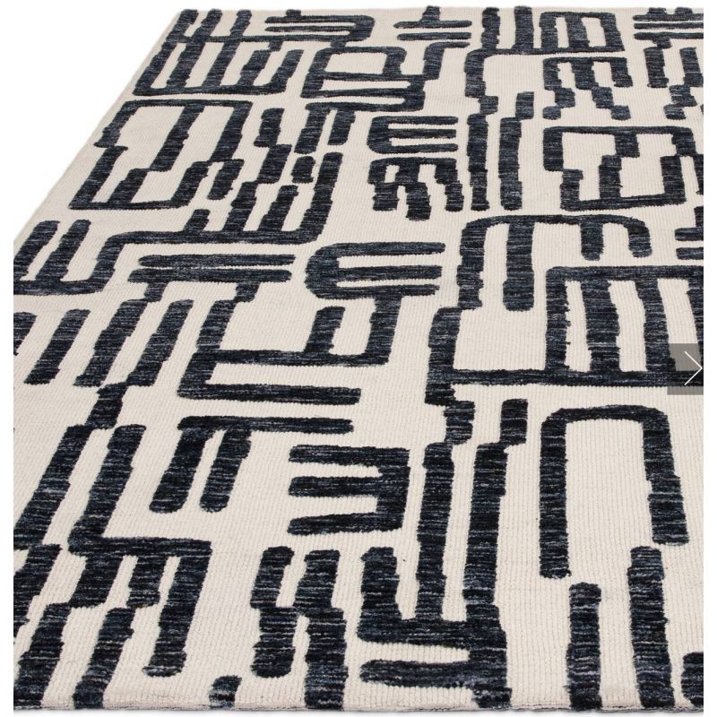 Tapis moderne abstrait noir et blanc script Brasilia