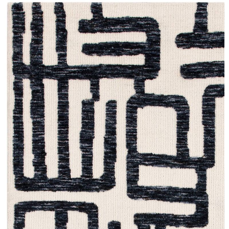 Tapis moderne abstrait noir et blanc script Brasilia