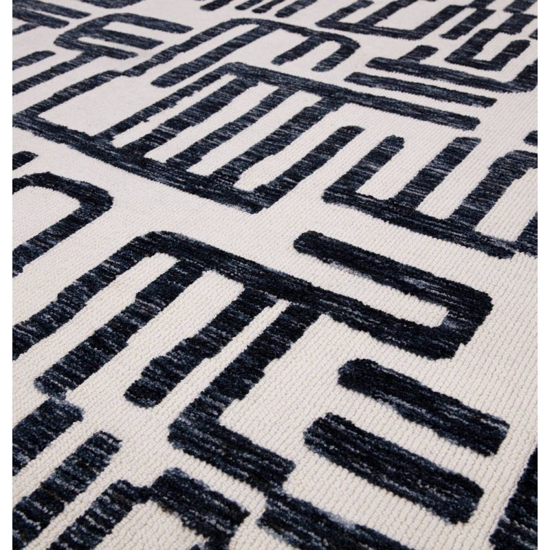 Tapis moderne abstrait noir et blanc script Brasilia