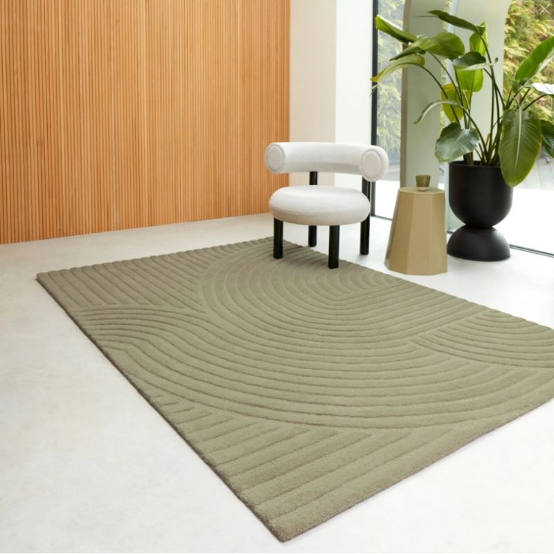 Tapis moderne motifs ronds en relief laine vert sauge Honiara ambiance