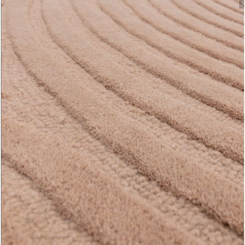 Tapis moderne motifs ronds en relief laine rose blush Honiara detail