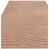 Tapis moderne motifs ronds en relief laine rose blush Honiara dessins