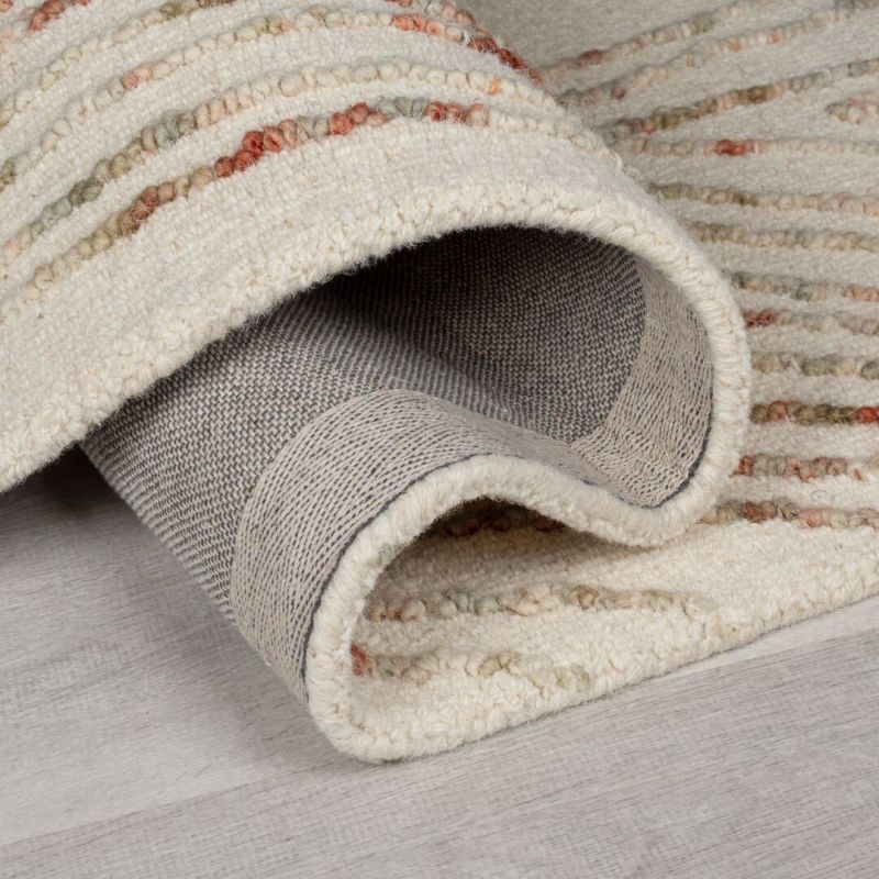 Tapis original en laine écrue lignes oranges Memphis dos