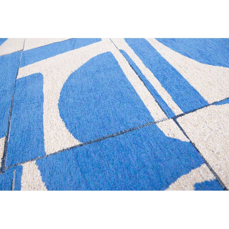 Tapis contemporain en polyester recyclé Papercut Campanulamotif