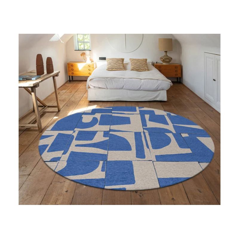 Tapis contemporain rond bleu en PET Papercut Campanula