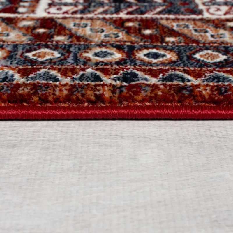 Tapis polypropylène motifs ethniques rouge Babylon épaisseur