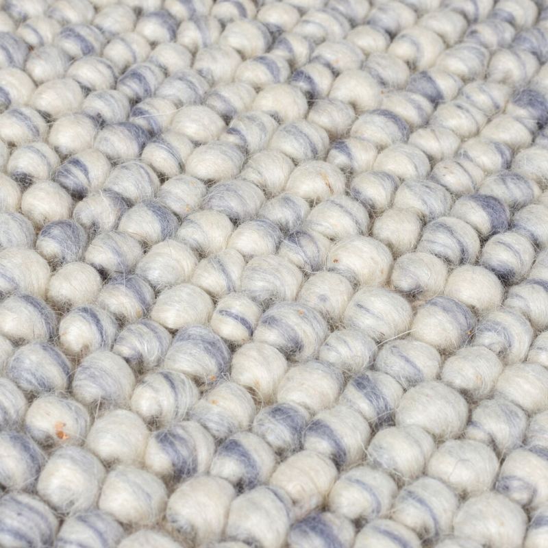 Tapis en laine effet bulles bleu chiné Minerals dessin