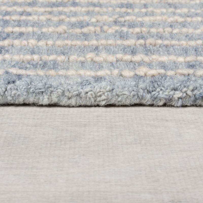 Tapis original en laine bleu Check epaisseur