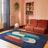 Tapis design en laine motif bleu foncé Pluriel salon