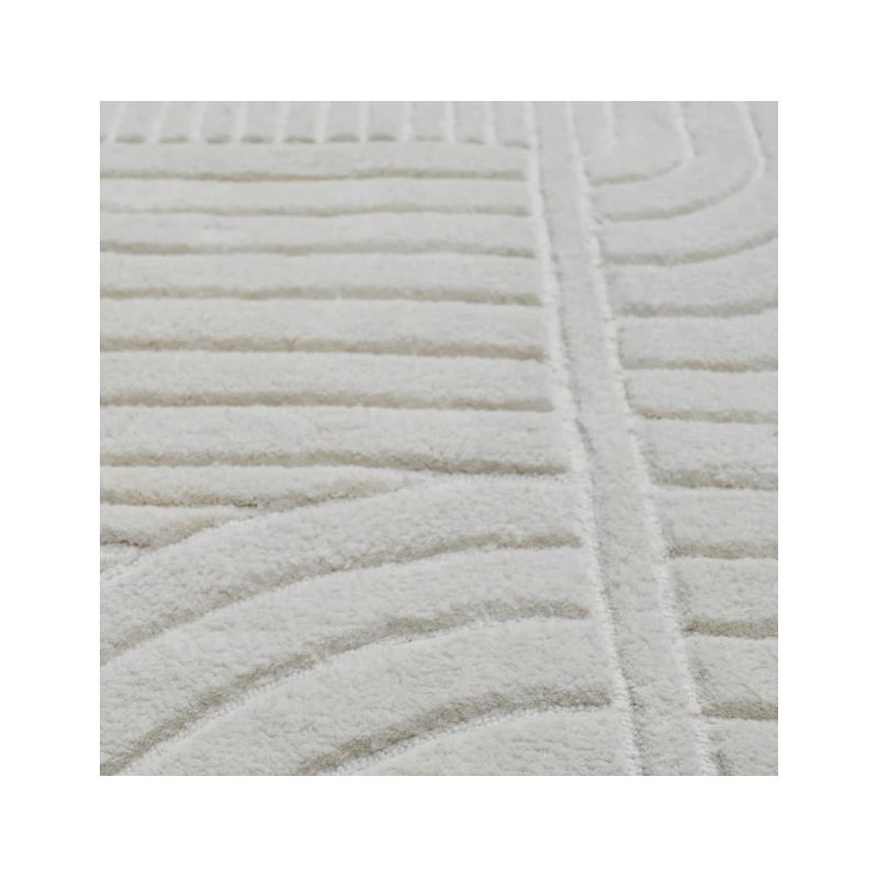 Tapis design motifs en relief blanc Equivok détail